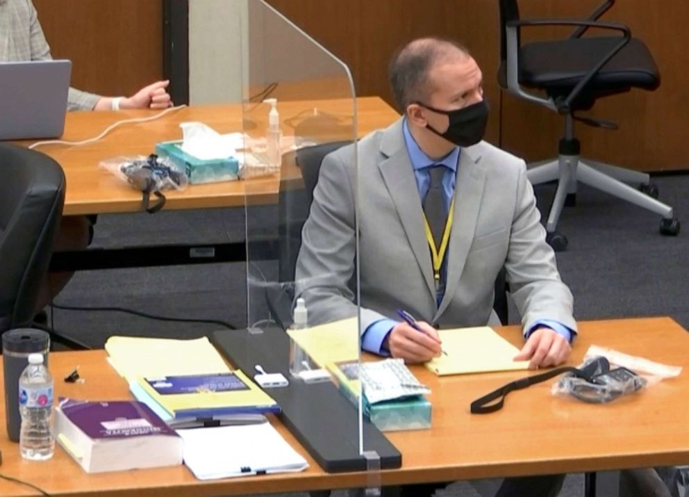 PHOTO: Defendant and former Minneapolis police officer Derek Chauvin, listens as Hennepin County Judge Peter Cahill presides over pretrial motions before jury selection, March 9, 2021, at the Hennepin County Courthouse in Minneapolis.