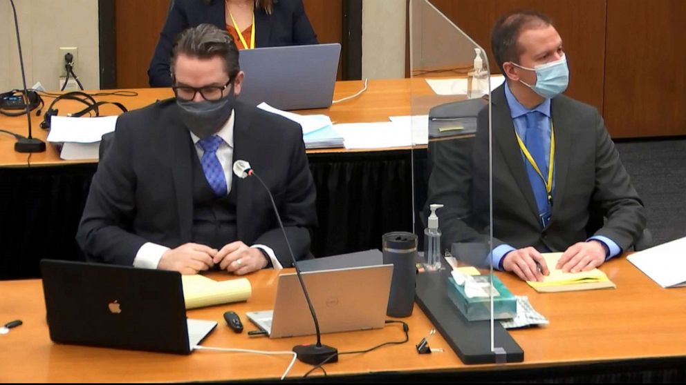 PHOTO: Defense attorney Eric Nelson, left, and former Minneapolis police officer Derek Chauvin, right, listen during court proceedings during the trial of Chauvin at the Hennepin County Courthouse in Minneapolis, April 14, 2021.