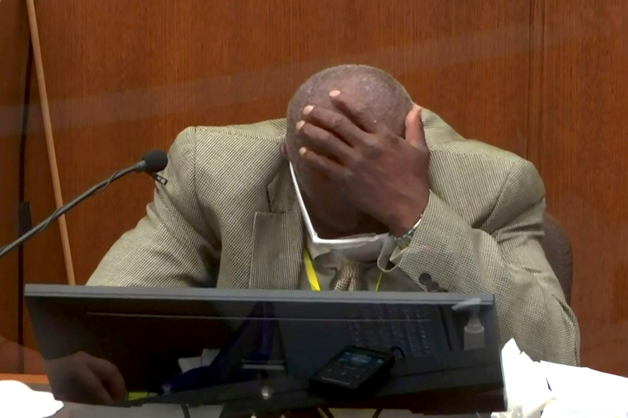 PHOTO: Charles McMillian reacts while speaking as a witness on the third day of the trial of former Minneapolis police officer Derek Chauvin in Minneapolis, Minnesota, March 31, 2021.