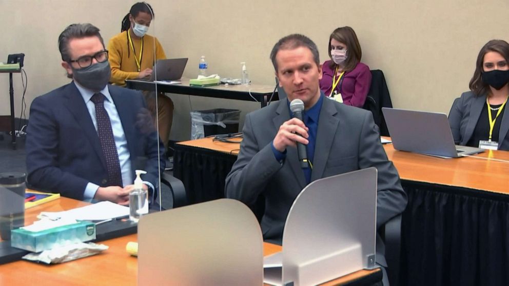 PHOTO: Former Minneapolis police officer Derek Chauvin speaks into a microphone during his trial in the death of George Floyd in Minneapolis, April 15, 2021. Defense attorney Eric Nelson is at left.