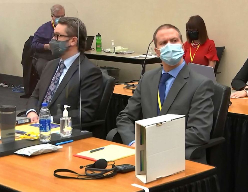 PHOTO: Defense attorney Eric Nelson, left, and former Minneapolis police officer Derek Chauvin listen to opening statements in the trial for the May 25, 2020, death of George Floyd at the Hennepin County Courthouse, March 29, 2021, in Minneapolis, Minn.