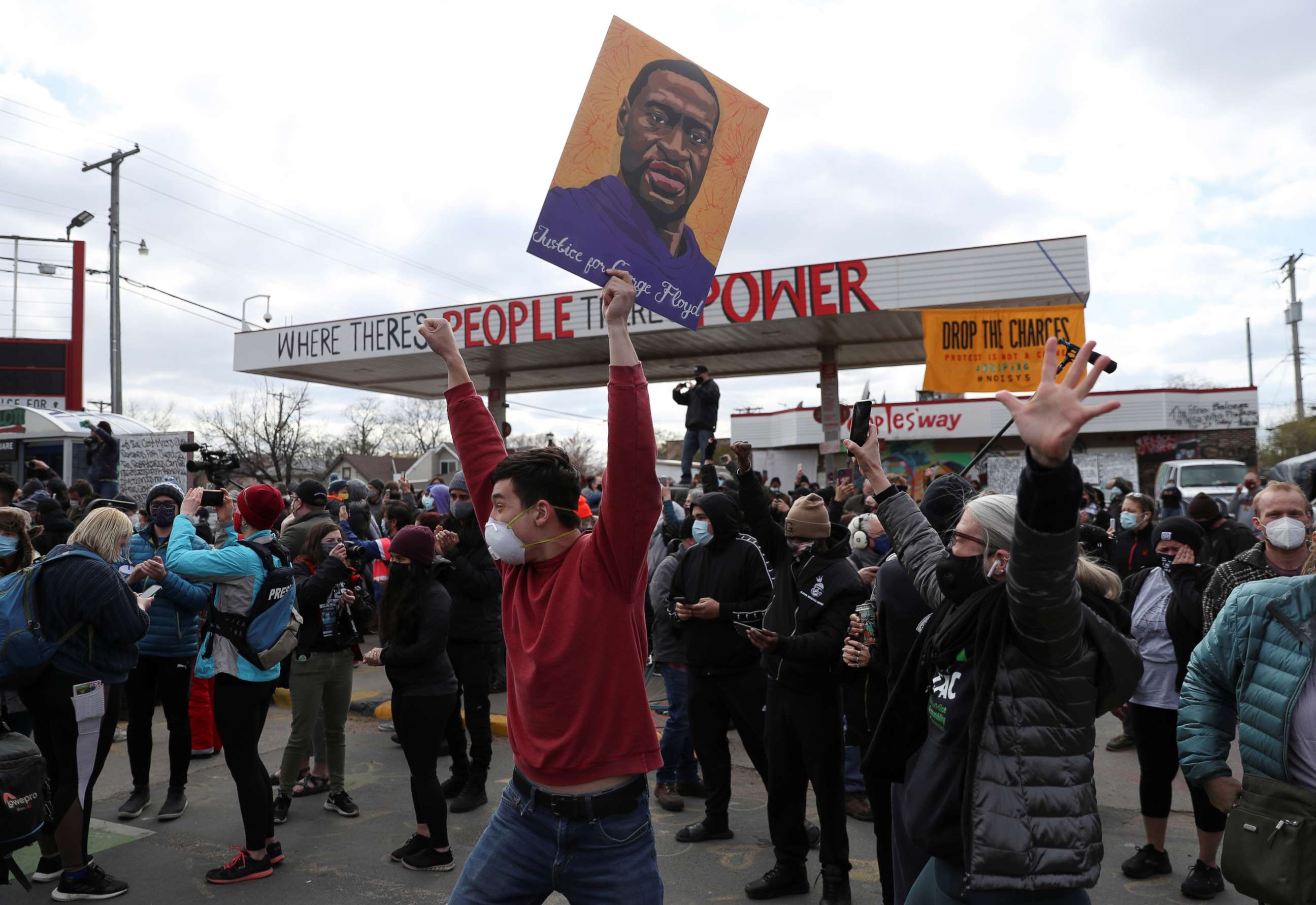 PHOTO: People react after the verdict in the trial of former Minneapolis police officer Derek Chauvin, found guilty of the death of George Floyd, at George Floyd Square in Minneapolis, Minnesota, April 20, 2021.