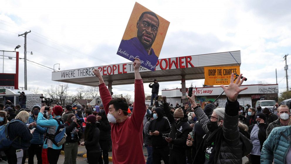 PHOTO: People react after the verdict in the trial of former Minneapolis police officer Derek Chauvin, found guilty of the death of George Floyd, at George Floyd Square in Minneapolis, Minnesota, April 20, 2021.