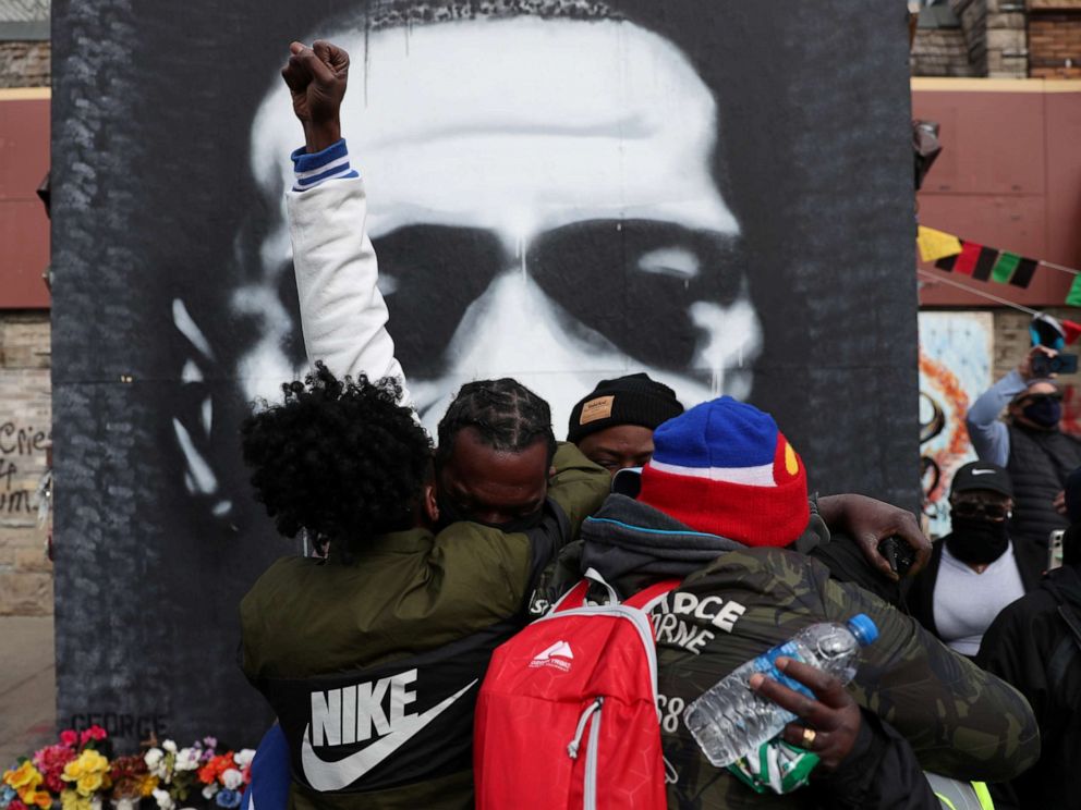 PHOTO: People react after the verdict in the trial of former Minneapolis police officer Derek Chauvin, found guilty of the death of George Floyd, at George Floyd Square in Minneapolis, Minnesota, April 20, 2021.