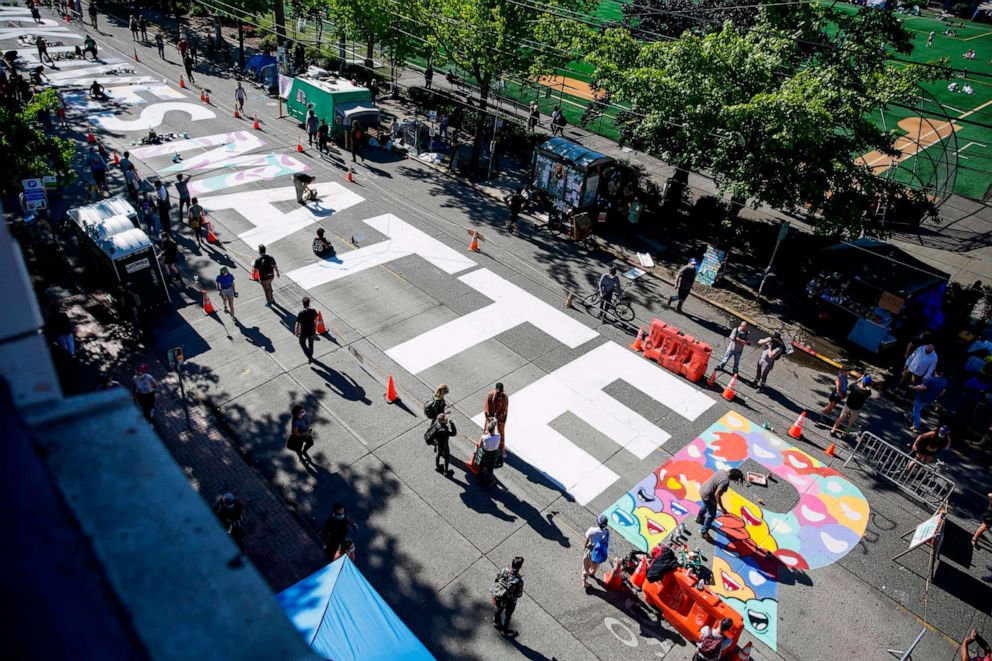 PHOTO: The words "Black Lives Matter" are painted in the middle of East Pine Street in the newly created Capitol Hill Autonomous Zone (CHAZ), in Seattle, June 11, 2020.