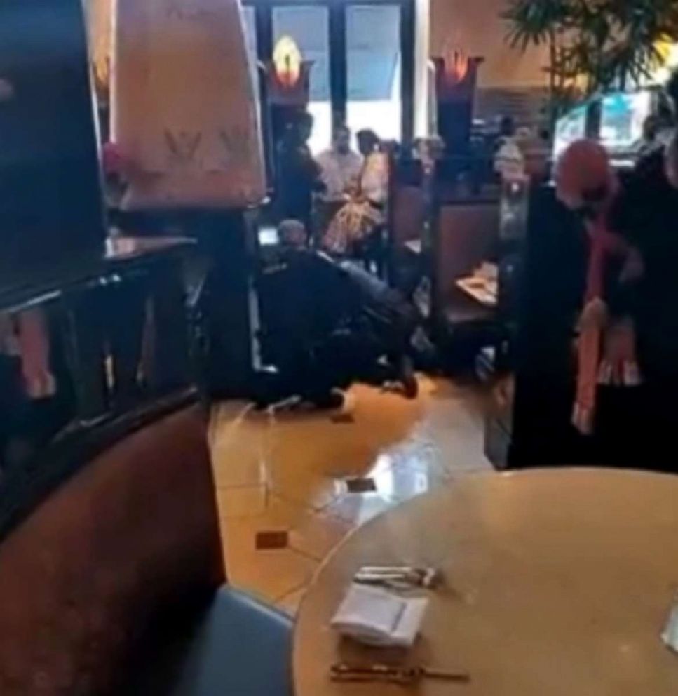 PHOTO: A man was arrested and will be charged with disorderly conduct after a large crowd gathered at a Cheesecake Factory in Arlington, Va., Dec. 5, 2018, during a cheesecake giveaway.