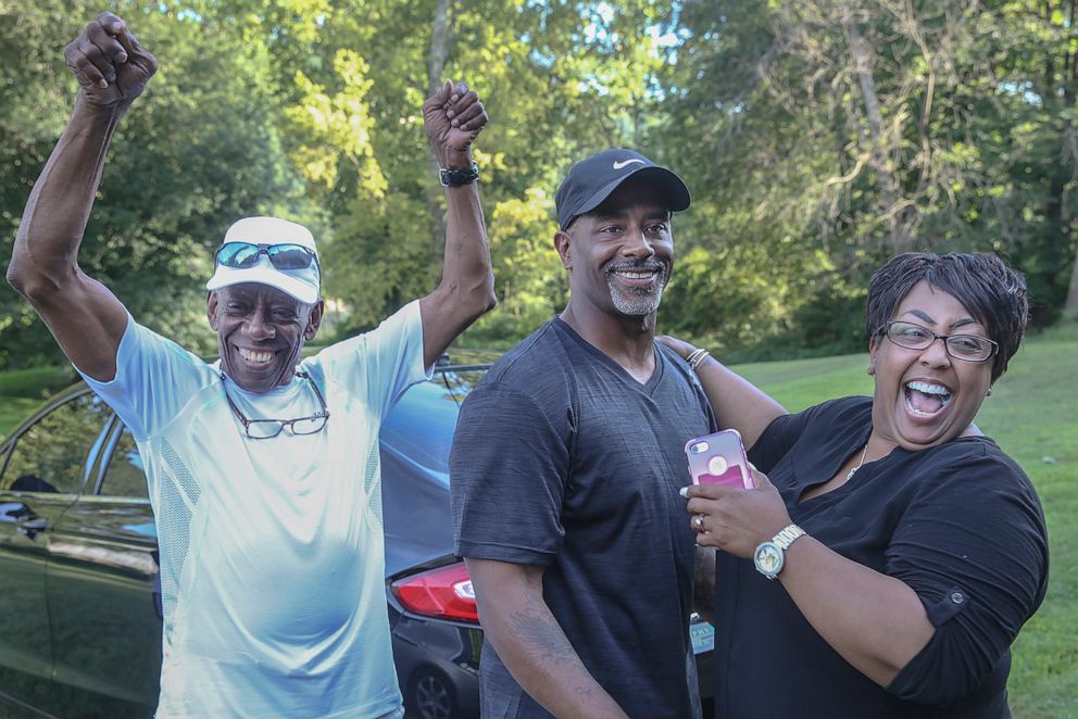 PHOTO: Chester Hollman III celebrates with his father Chester Hollman, Jr., left and his sister Deanna as he takes his first steps of freedom from the State Correctional Institution at Retreat in Hunlock Creek, Pennsylvania on Monday, July 15, 2019.