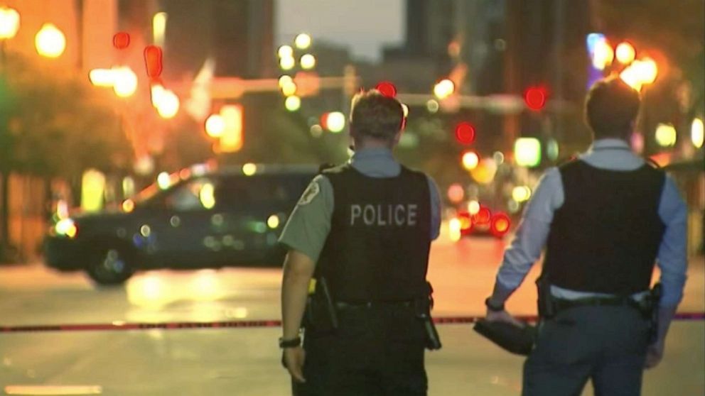 PHOTO: Police officers at the scene of a shooting, July 18, 2021, in Chicago.
