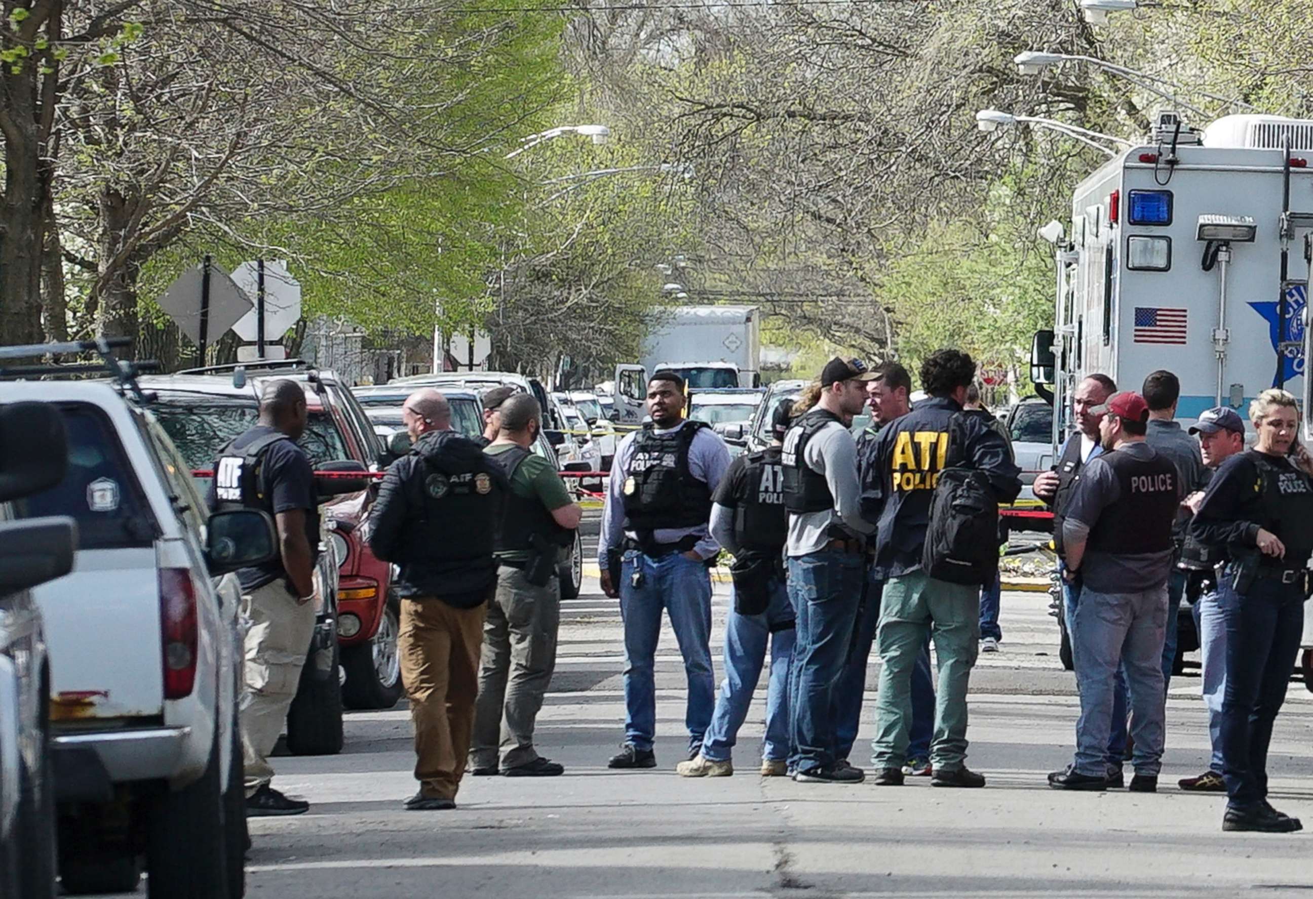 PHOTO: Police from various agencies investigate the scene where a Bureau of Alcohol, Tobacco, Firearms and Explosives agent was shot, Friday, May 4, 2018, in Chicago.