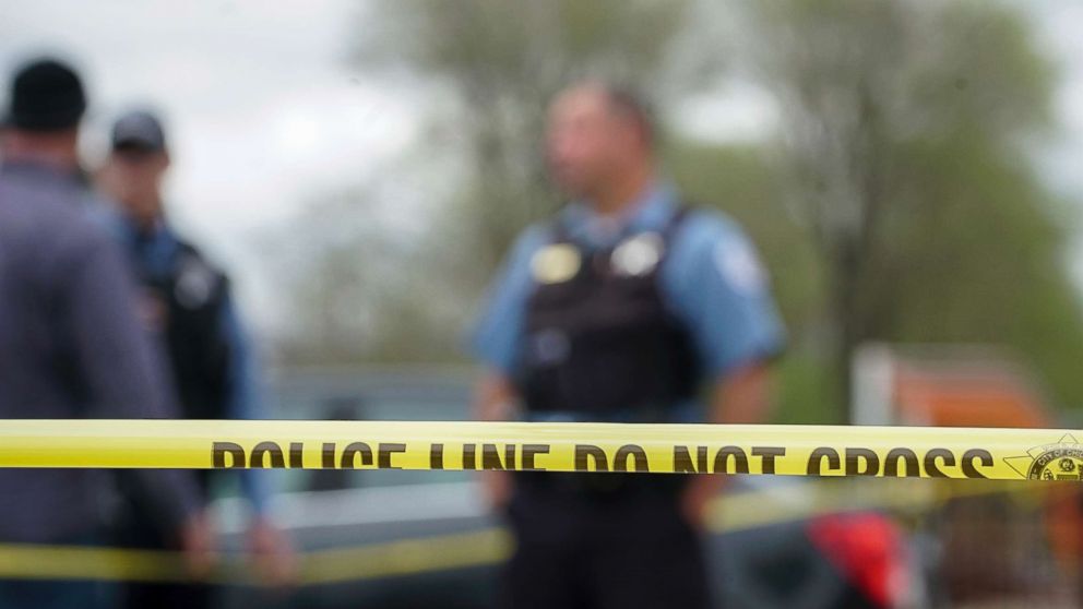 Police from various agencies investigate the scene where a Bureau of Alcohol, Tobacco, Firearms and Explosives agent was shot, May 4, 2018, in Chicago.