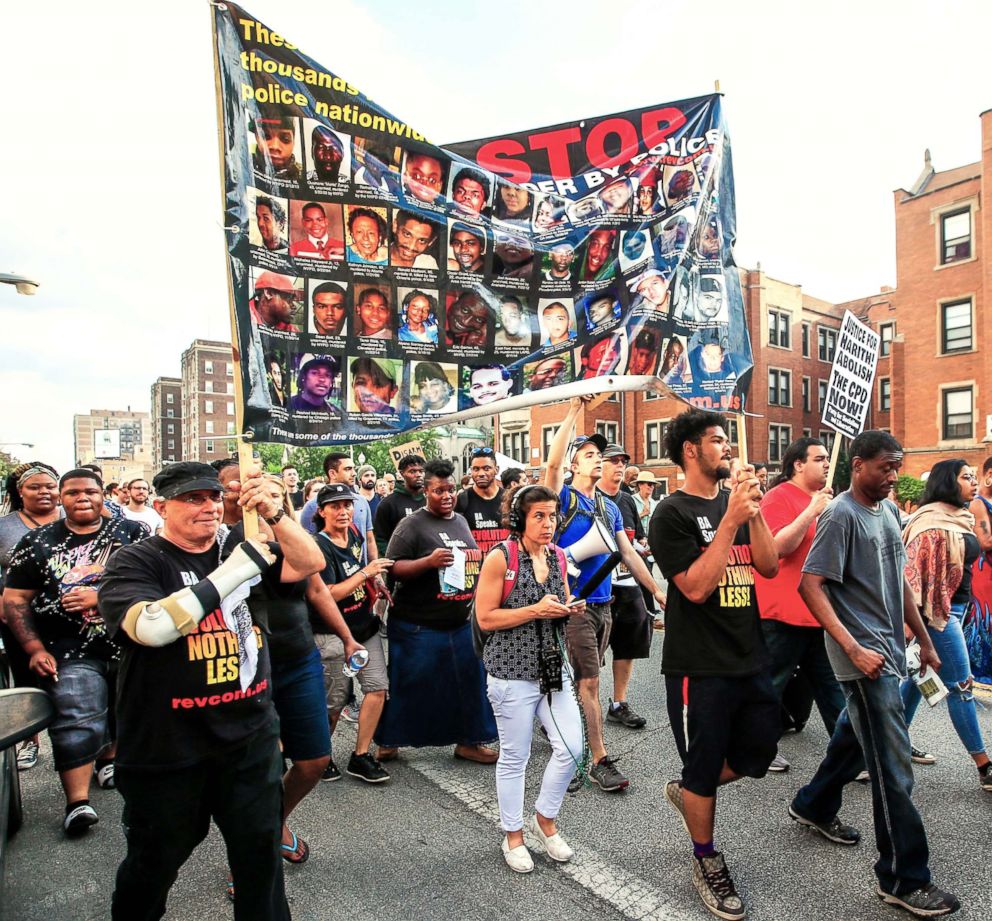 PHOTO: Activists gather to march, shout, pray and protest against the alleged shooting of Harith Augustus by a Chicago Police officer during a confrontation in Chicago, July 15, 2018.
