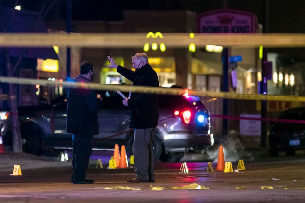 PHOTO: Chicago and Evanston police investigate a crime scene after a gunman went on a shooting spree before being killed by police during a shootout in Evanston, Ill., Saturday night, Jan. 9, 2021.