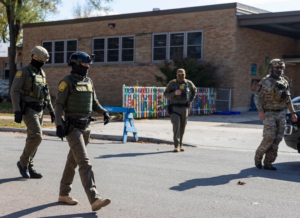 PHOTO: Border Patrol agents leave after detaining a man working near Frederick Stock Public School during immigration enforcement operations, Oct. 31, 2025, in Chicago.