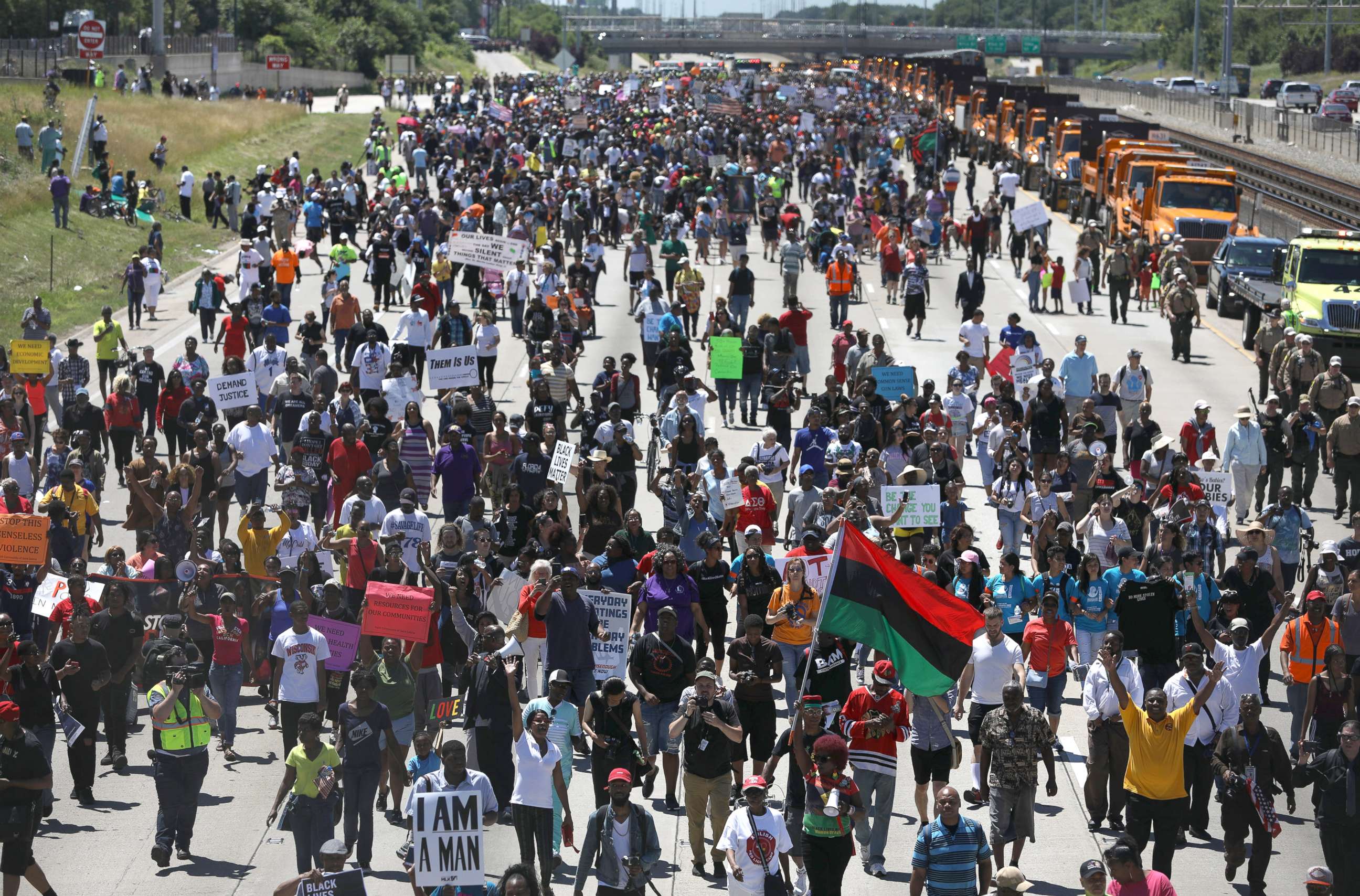 PHOTO: Thousands of protesters walk north on the Dan Ryan Expressway in Chicago after blocking the transportation artery in an anti-violence march, July 7, 2018.