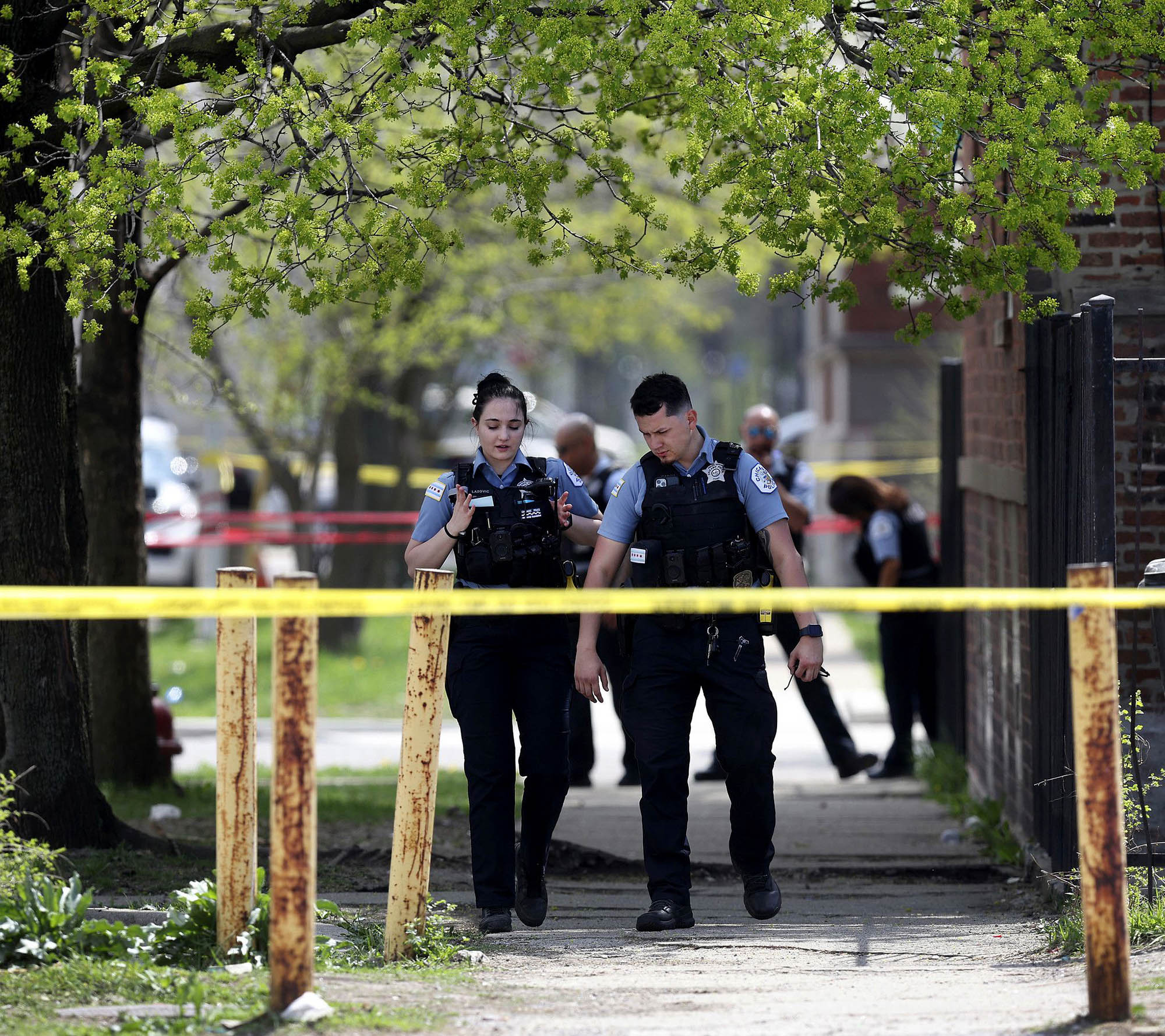 PHOTO: Chicago police work the scene following a police involved shooting in the 3800 block of W. Flournoy, April 15, 2023, in Chicago.