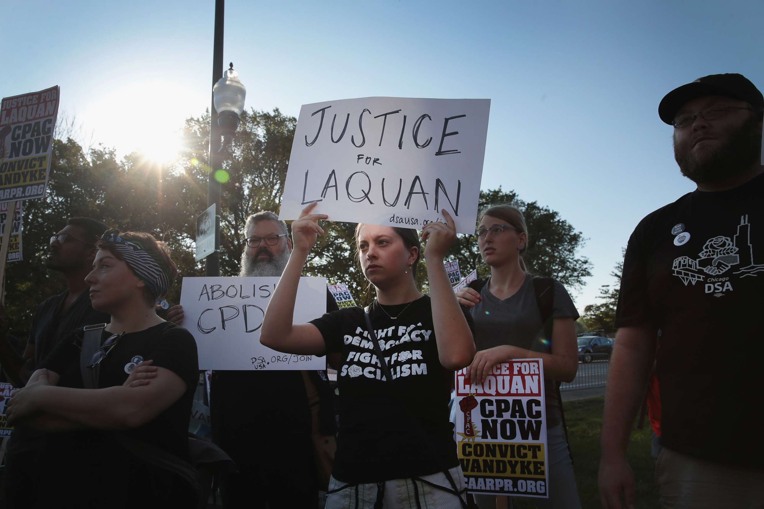 PHOTO: Demonstrators protest outside of the Leighton Criminal Courts Building as Jury selection begins in the murder trial for Chicago police officer Jason Van Dyke, Sept. 5, 2018, in Chicago, Illinois.