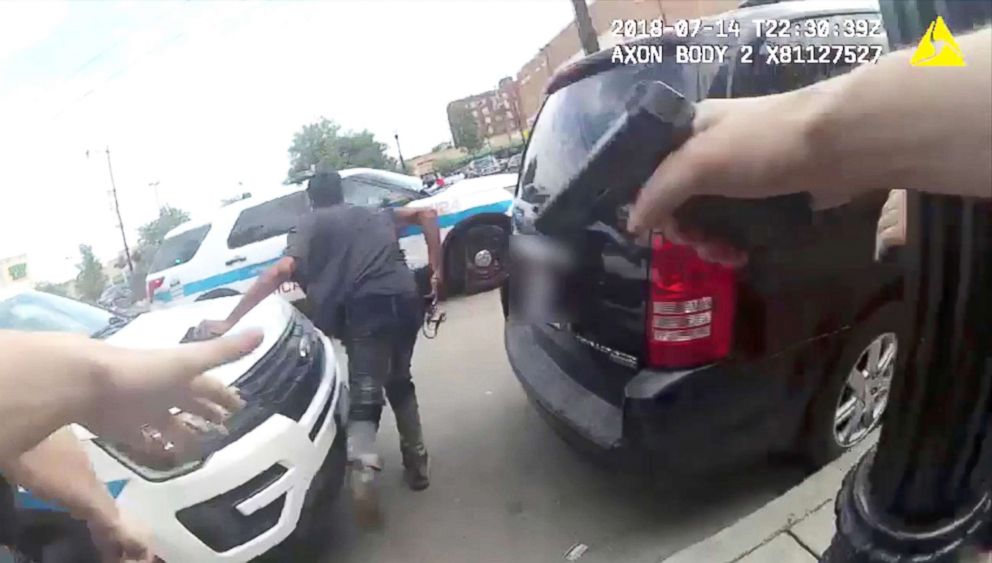 PHOTO: Harith Augustus, 37, fatally shot by police, is seen fleeing from Chicago Police in this still image from police body camera video footage taken in Chicago, July 14, 2018 and released on July 15, 2018.