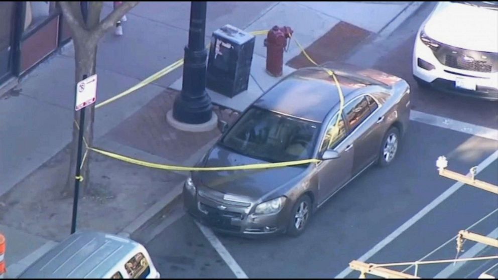 PHOTO: Police tape surrounds a car where a 5-month-old baby was allegedly shot in Chicago, June 25, 2022.