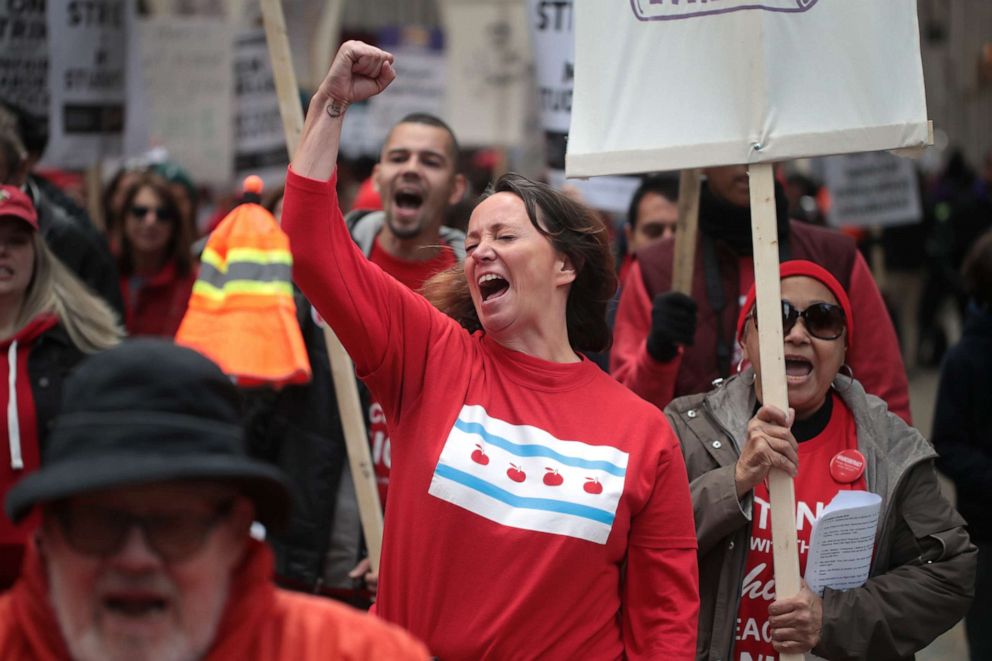 PHOTO: Chicago public school teachers and their supporters march through the Loop on Oct. 17, 2019 in Chicago.