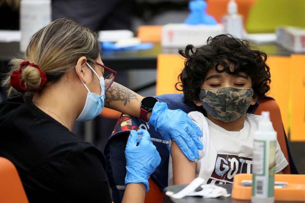 PHOTO: Seven-year-old Milan Patel receives a COVID-19 vaccine at Michele Clark High School on Nov. 12, 2021, in Chicago.