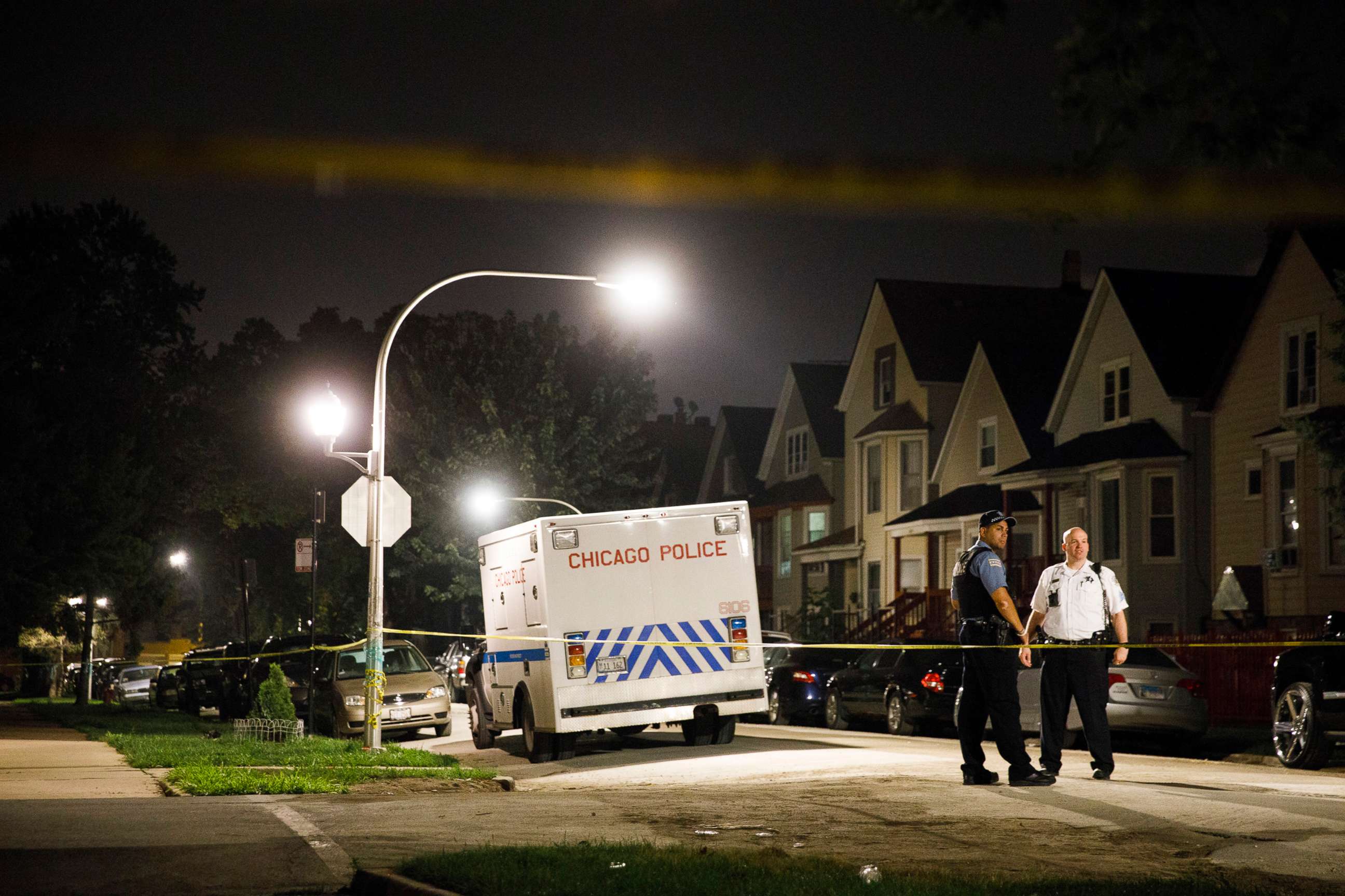 PHOTO: Police work the scene where two people were shot near the intersection of North Eldridge Avenue and North Drake Avenue, Aug. 19, 2018 in Chicago, Ill. 