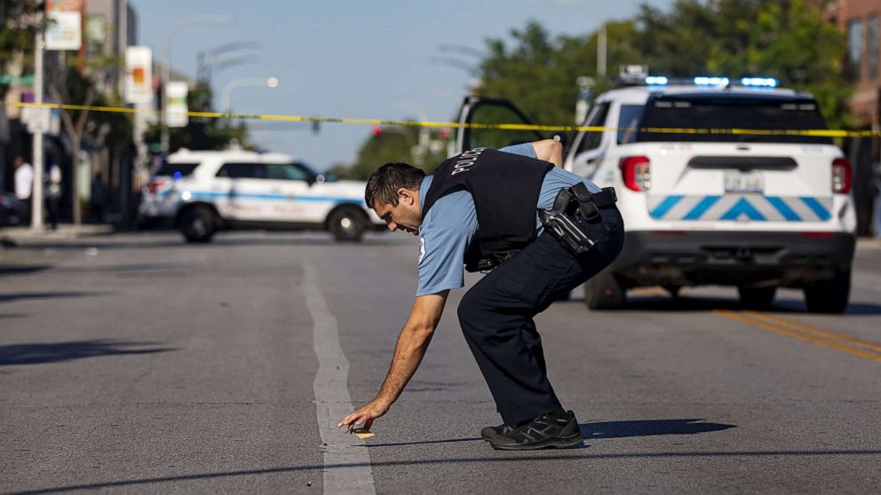 PHOTO: Chicago police investigate a shooting, Sept. 5, 2021, on West Chicago Avenue in Chicago.