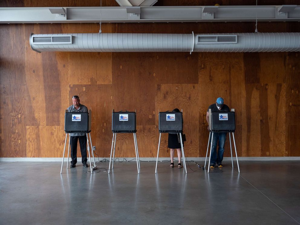 PHOTO: Voters cast their ballots on Primary Day at the No. 571 Boathouse, June 28, 2022, in Chicago.