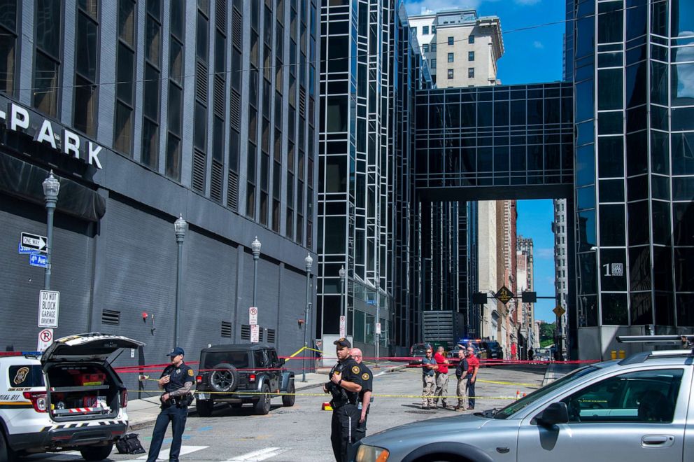 PHOTO: Police guard the scene of a drive-by shooting that happened on May 29, 2022, on the corner of Stanwix Street and Forbes Avenue in downtown Pittsburgh. A 1-year-old child was killed in the shooting, according to authorities.