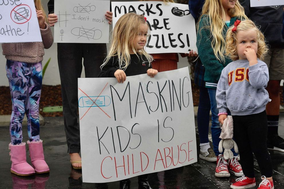 PHOTO: Children join an anti-mask rally outside the Orange County Department of Education in Costa Mesa, Calif., May 17, 2021.