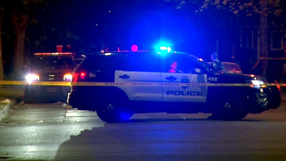 PHOTO: Police investigate the scene of a shooting that killed a little girl, May 18, 2021, in Minneapolis.