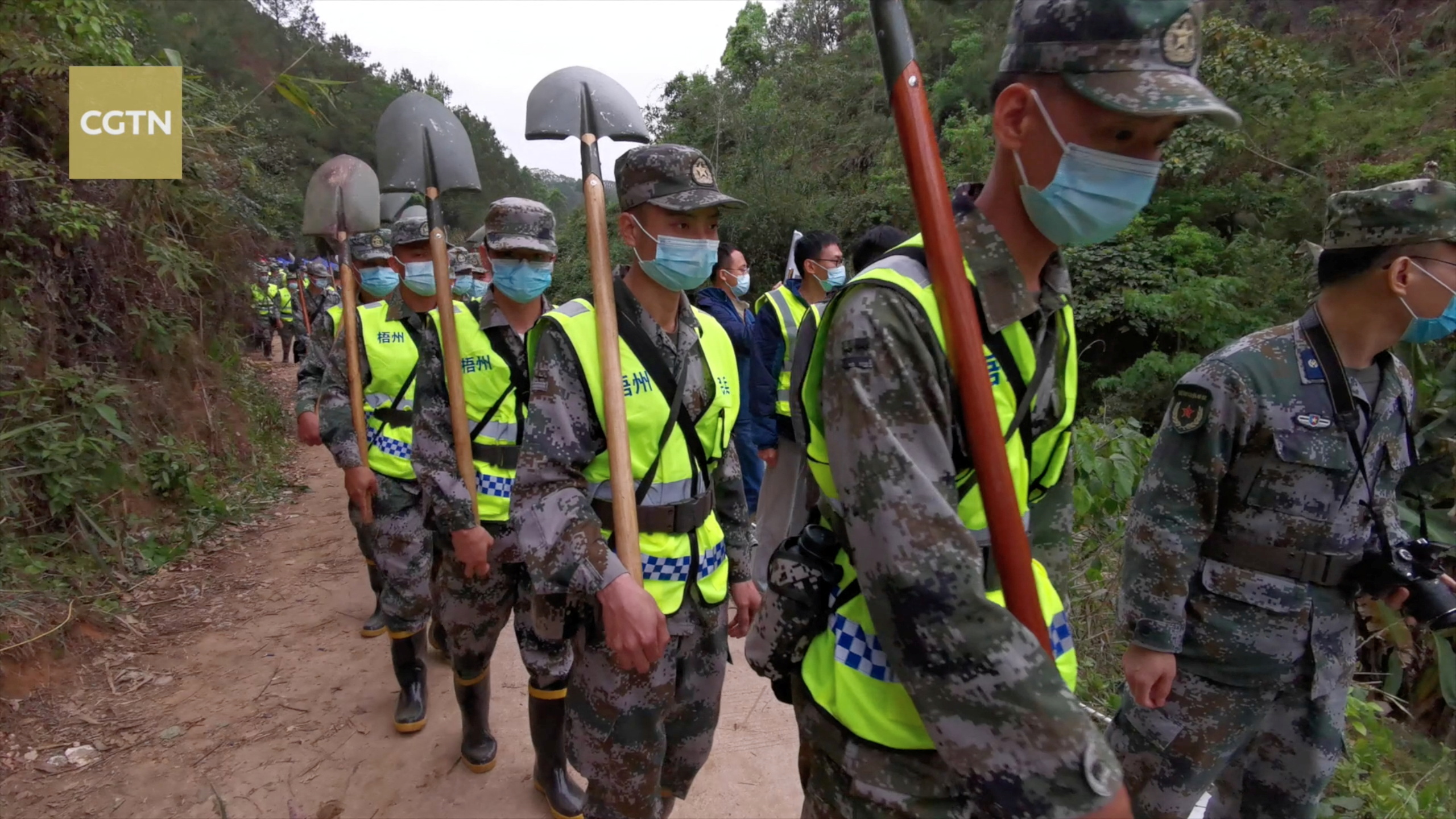 PHOTO: Rescuers work, March 22, 2022, at the site where a China Eastern Airlines Boeing 737-800 plane, flight MU5735, crashed in Wuzhou, Guangxi Zhuang Autonomous Region, China.