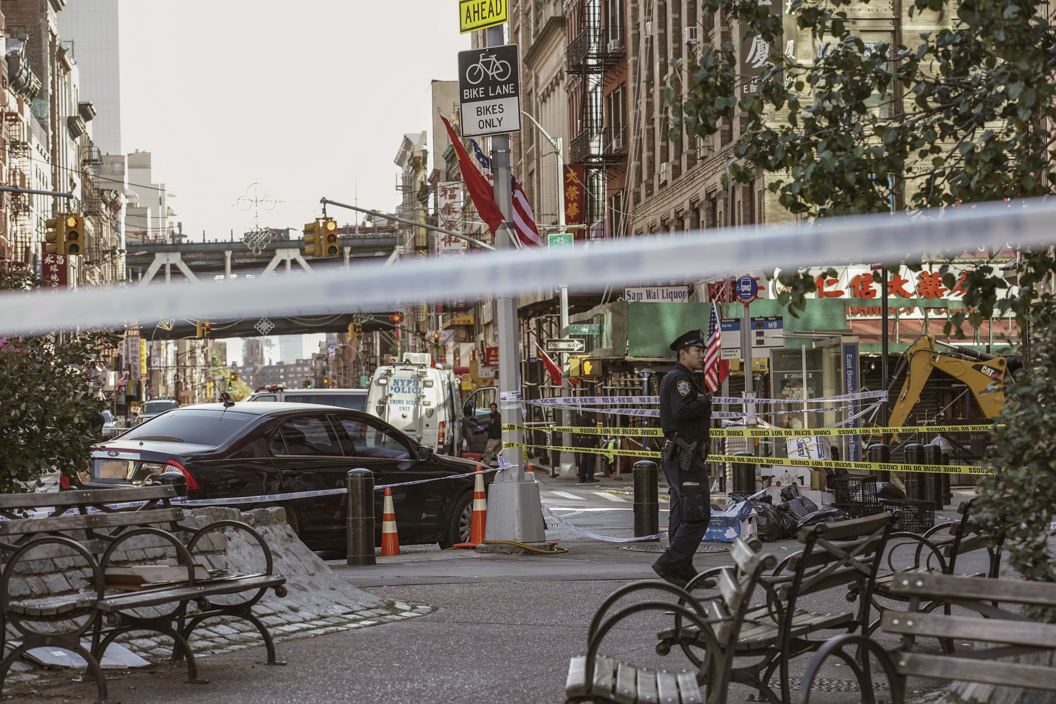PHOTO: New York Police Department officers investigate the scene of an attack in Manhattan's Chinatown neighborhood, Oct. 5, 2019, in New York.  