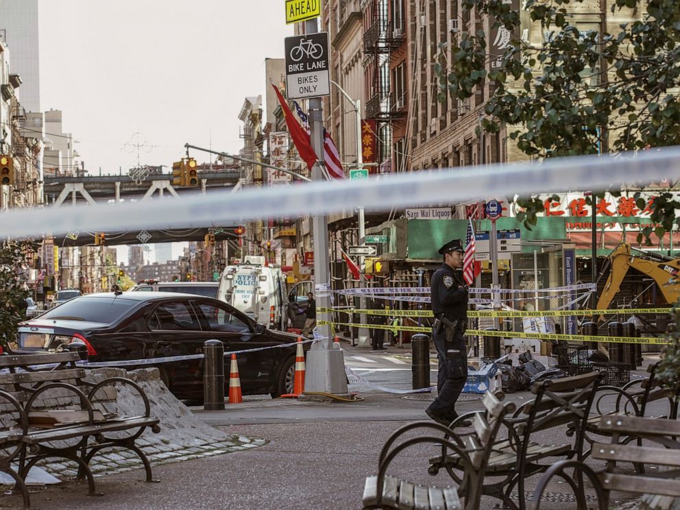 PHOTO: New York Police Department officers investigate the scene of an attack in Manhattans Chinatown neighborhood, Oct. 5, 2019, in New York.