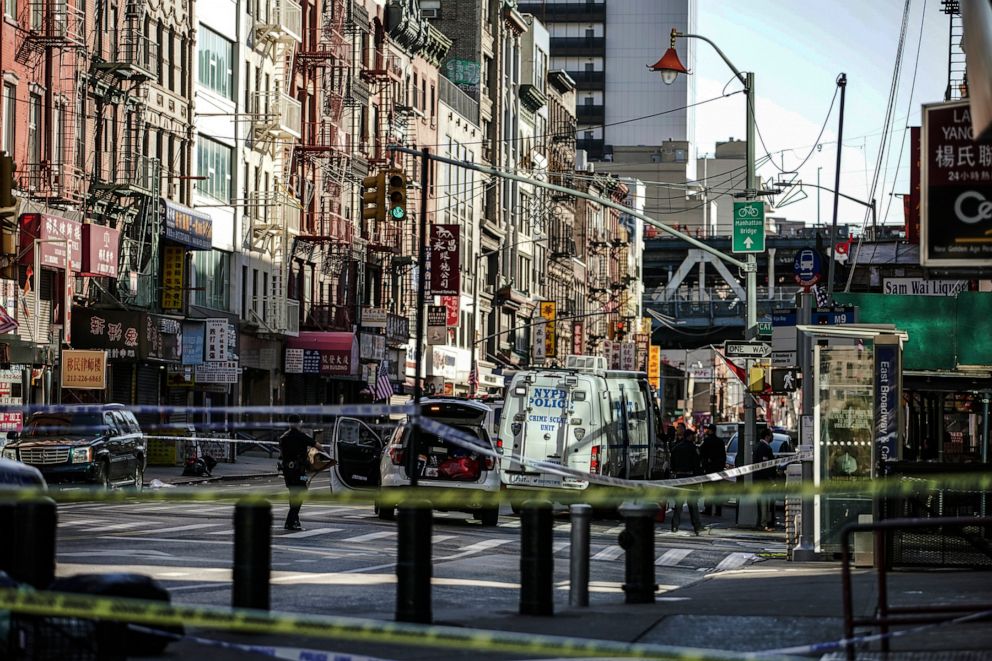 PHOTO: New York Police Department officers investigate the scene of an attack in Manhattan's Chinatown neighborhood, Oct. 5, 2019, in New York.  