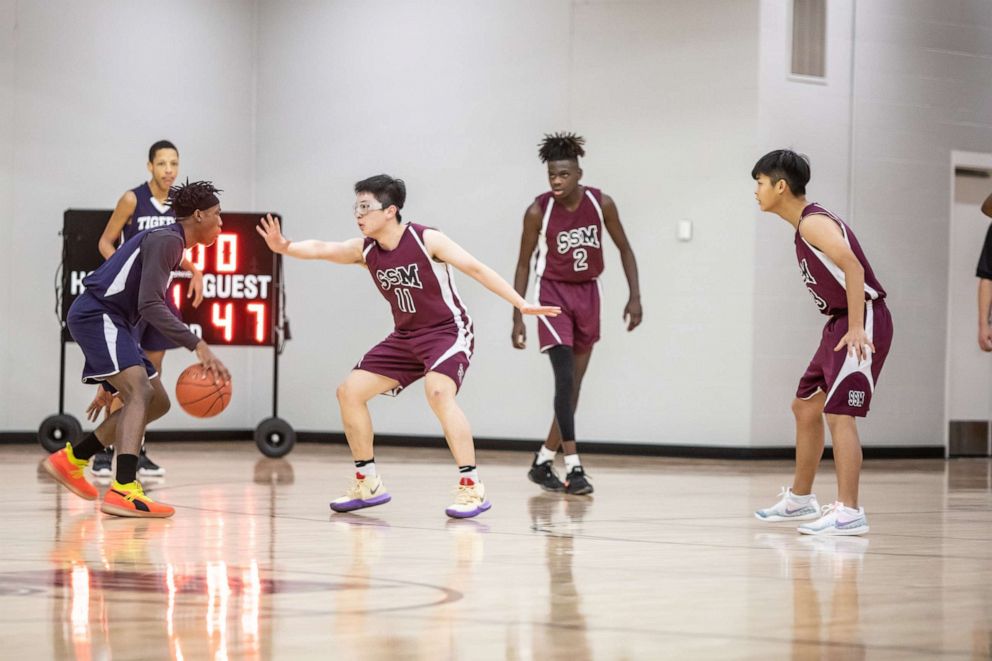 PHOTO: The 2020 coronavirus pandemic forced an abrupt end to sports seasons nationwide. Shattuck-St. Mary's School senior Steven Song, center, played one of the final games of his high school career.