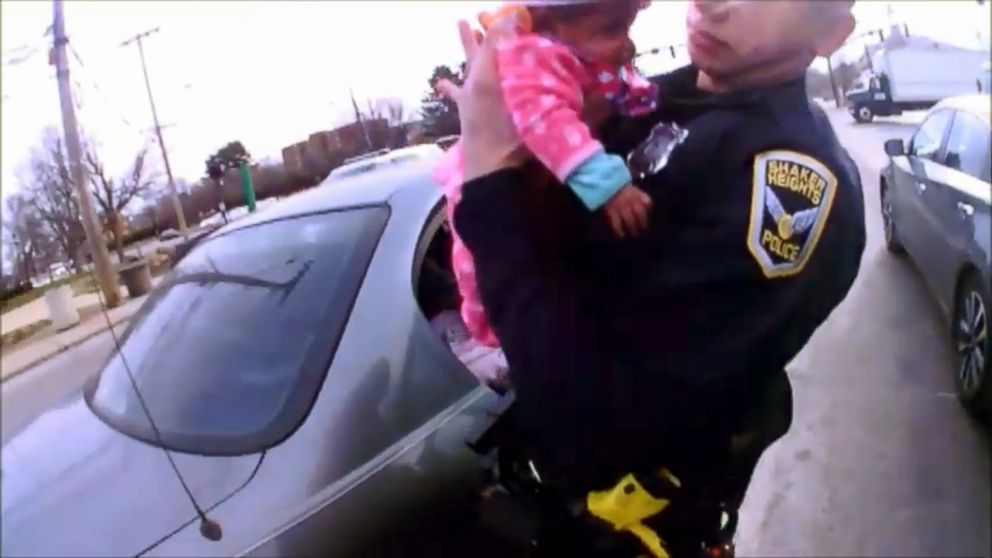 Shaker Heights, Ohio police officers Alex Oklander and Ryan Sidders saved a choking 2-month-old girl after approaching a disabled vehicle on Tuesday, March 20, 2018.