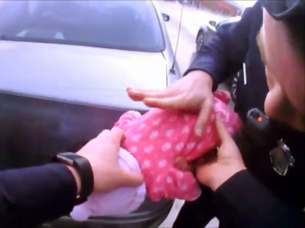 PHOTO: Shaker Heights, Ohio police officers Alex Oklander and Ryan Sidders saved a choking 2-month-old girl after approaching a disabled vehicle on Tuesday, March 20, 2018.