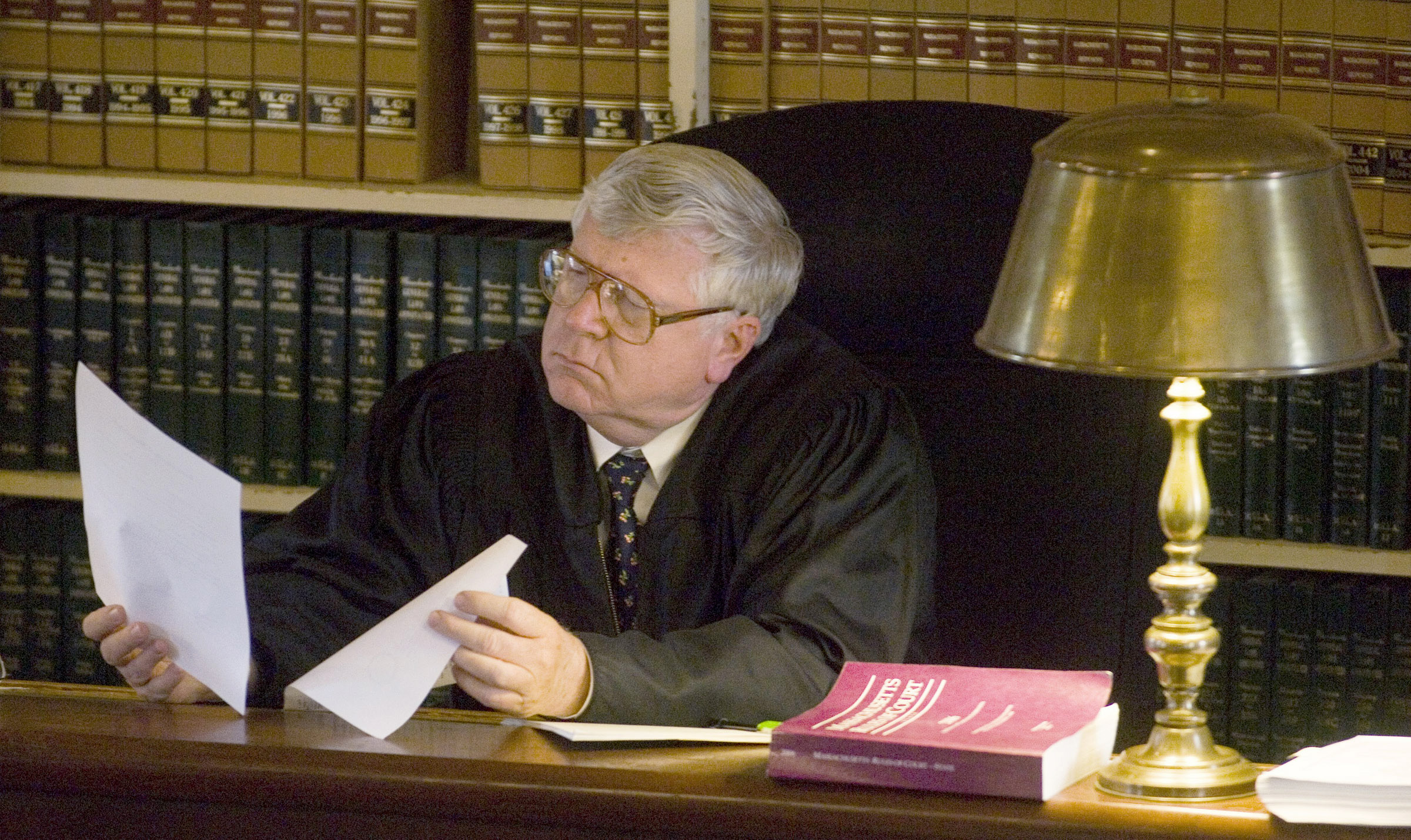 PHOTO: Superior Court Judge Gary Nickerson reviews court documents during the murder trial of Christopher McCowen at Barnstable Superior Court in Barnstable, Mass., Oct. 31, 2006. 