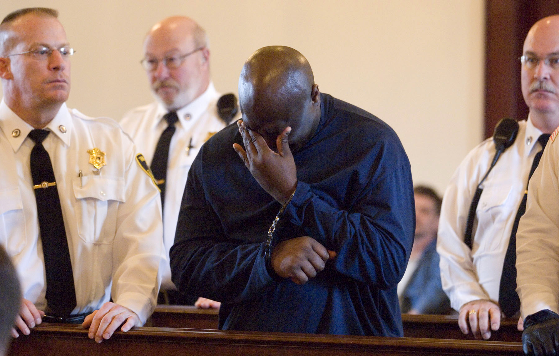 PHOTO: Christopher McCowen wipes away tears as he is sentenced after being convicted  of rape and murder in the slaying of a fashion writer Christa Worthington, Nov. 16, 2006, in Barnstable, Mass.