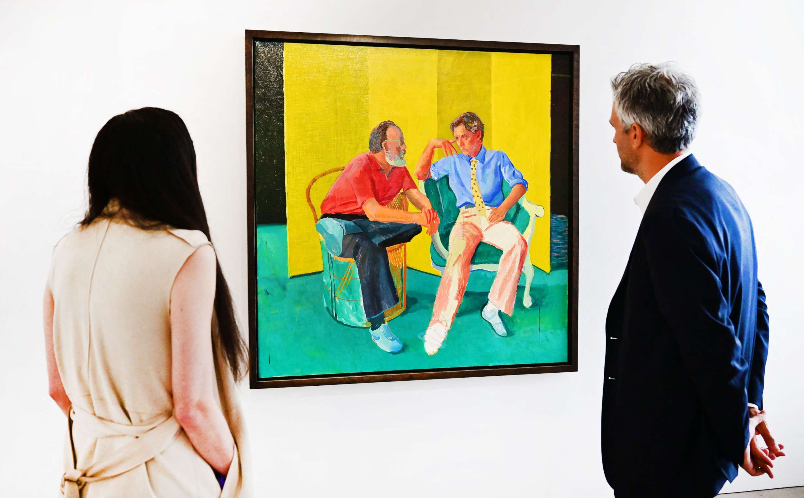 PHOTO: In this file photo taken on October 12, 2022 Christie's staff view "The Conversation" by David Hockney on display at Christie's Los Angeles in Beverly Hills, California during the media preview of "Visionary: The Paul Allen Collection."