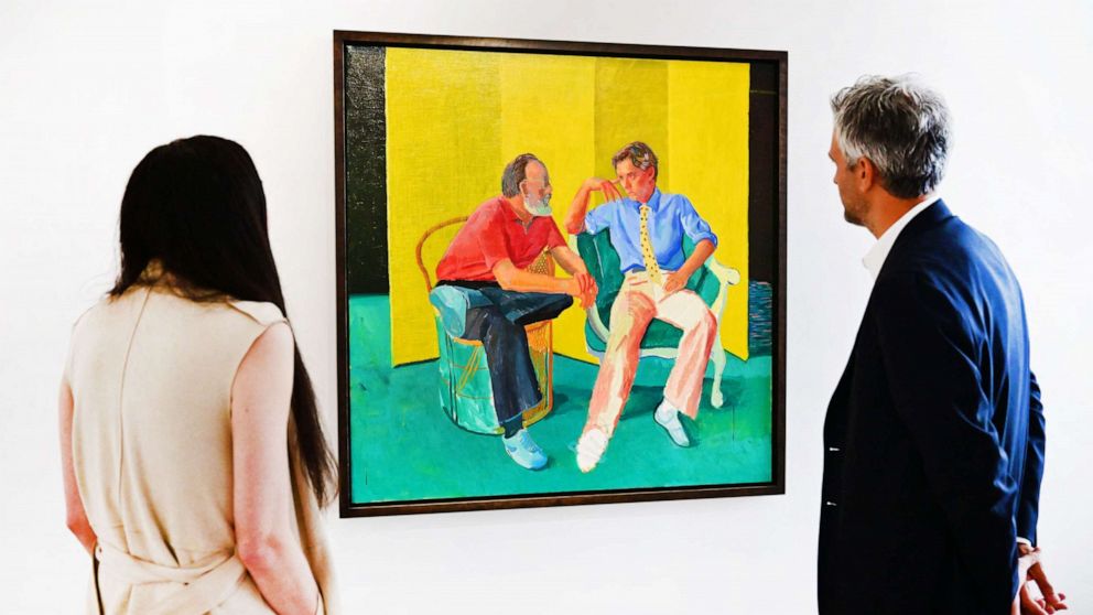 PHOTO: In this file photo taken on October 12, 2022 Christie's staff view "The Conversation" by David Hockney on display at Christie's Los Angeles in Beverly Hills, California during the media preview of "Visionary: The Paul Allen Collection."
