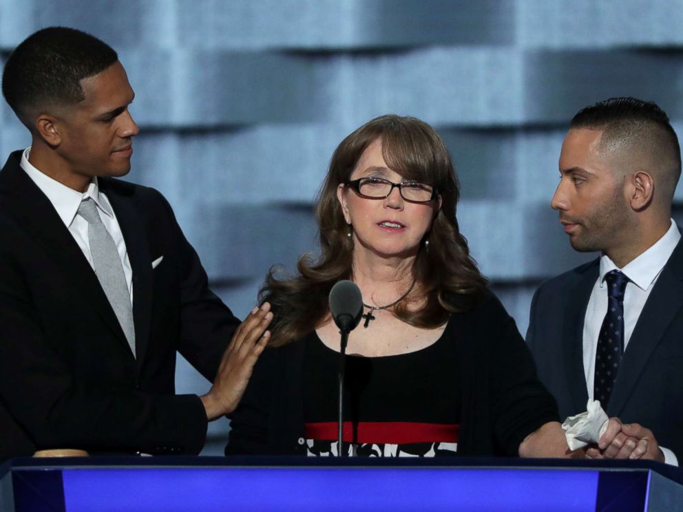 PHOTO: Christine Leinonen is comforted by Brandon Wolf (L) and Jose Arriagada (R), survivors of the attack at the Pulse nightclub in Orlando, at the Democratic National Convention at the Wells Fargo Center, July 27, 2016 in Philadelphia.