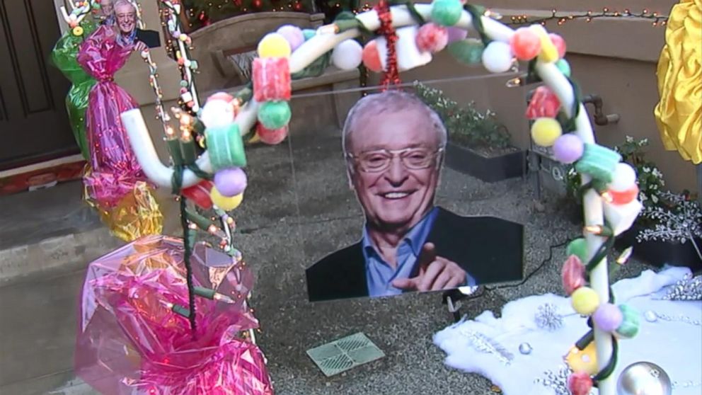 PHOTO: Kyle and Cori Gunderson of Costa Mesa, California decorated their house is Christmas-related puns, like Michael Caine surrounded by candy, for the holiday in this undated photo.