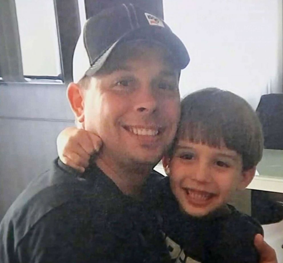 PHOTO: Christopher Brann and his son Nicolas pose in this undated photograph.