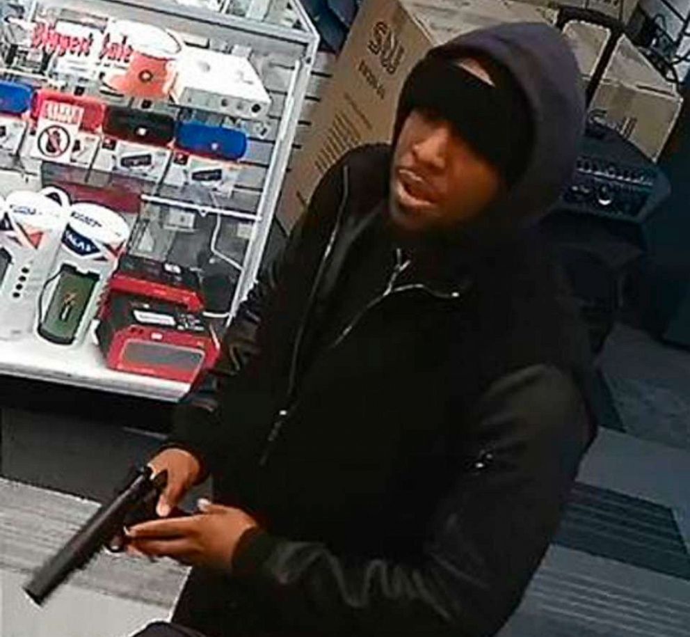 PHOTO: In this image taken from surveillance video provided by the New York Police Department, a man, identified by police as Christopher Ransom, is shown robbing a cell phone store, Saturday, Jan. 19, 2019 in the Queens borough of New York.