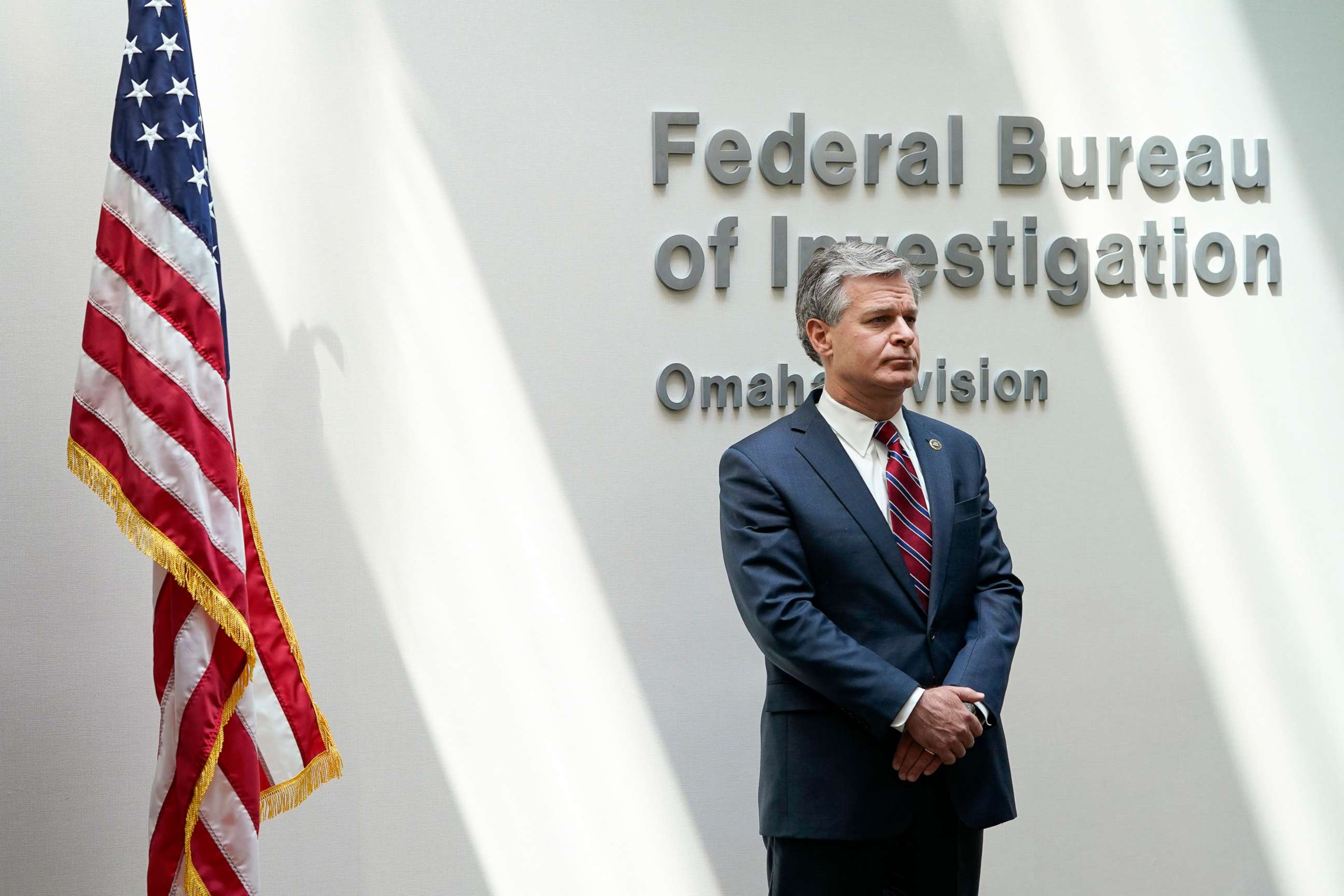 PHOTO: FBI Director Christopher Wray waits to speak at a news conference, on Aug. 10, 2022, in Omaha, Neb.