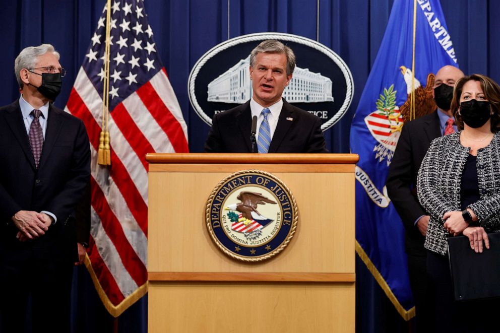 PHOTO: FBI Director Christopher Wray is flanked by U.S. Attorney General Merrick Garland and Deputy Attorney General Lisa Monaco during a news conference at the Justice Department in Washington, D.C., Nov. 8, 2021.