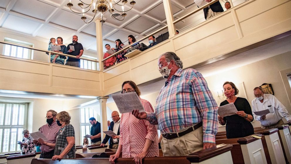 PHOTO: Worshipers wearing masks and practicing social distancing are seeing during service at Hopeful Baptist Church on Sunday, May 17, 2020, in Montpelier, VA.