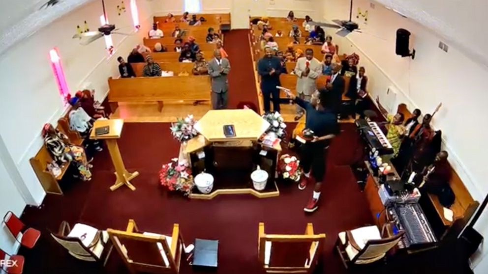 'Heroic' pastor tackles gunman at church altar