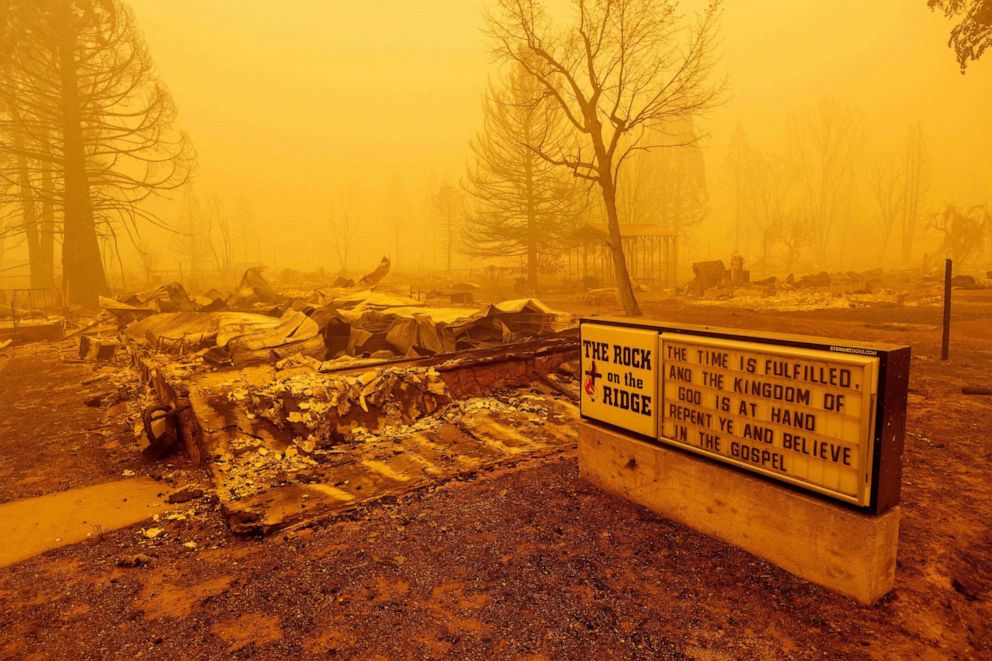 PHOTO: A burned church rests in heavy smoke during the Dixie Fire in Greenville, Calif., on Aug. 6, 2021.